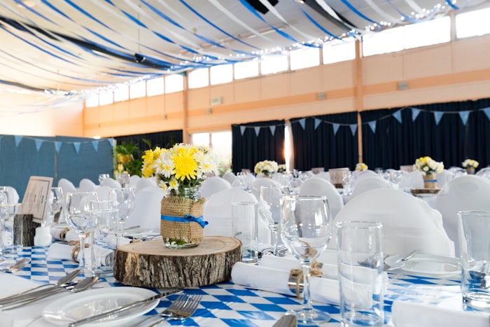 Elegantly set tables at an outdoor celebration event